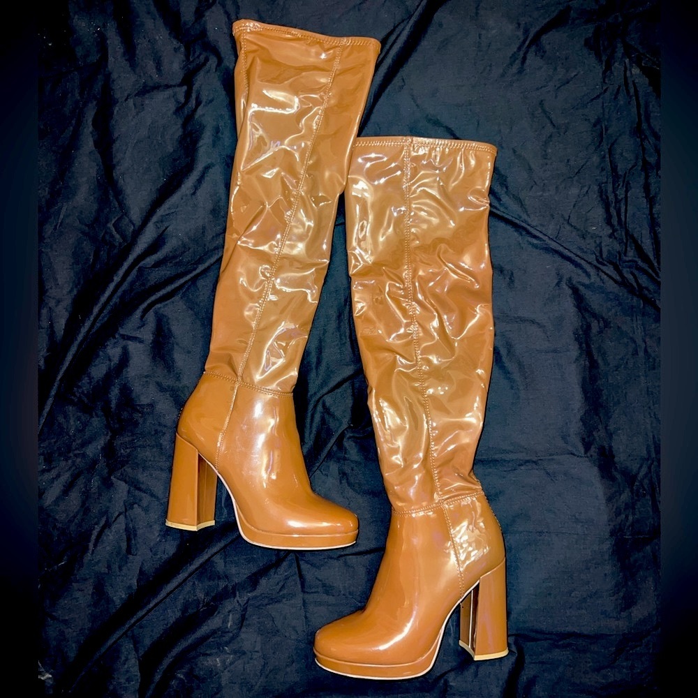 Thigh high patent leather boots